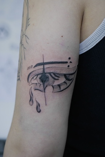 Tatouage graphique représentant un œil